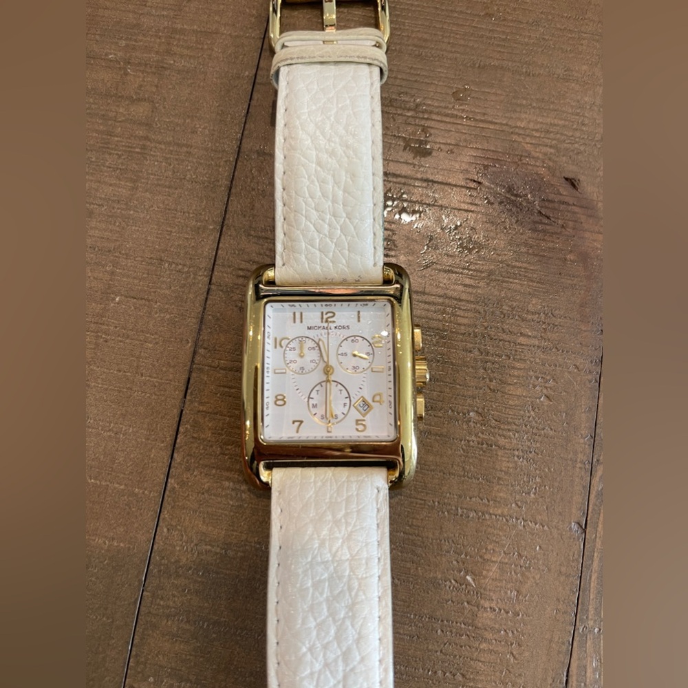 Michael kors women’s watch white leather and gold.